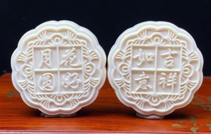 两枚猛犸象牙月饼被拍卖_猛犸象牙与象牙_猛犸象牙和象牙的牙纹